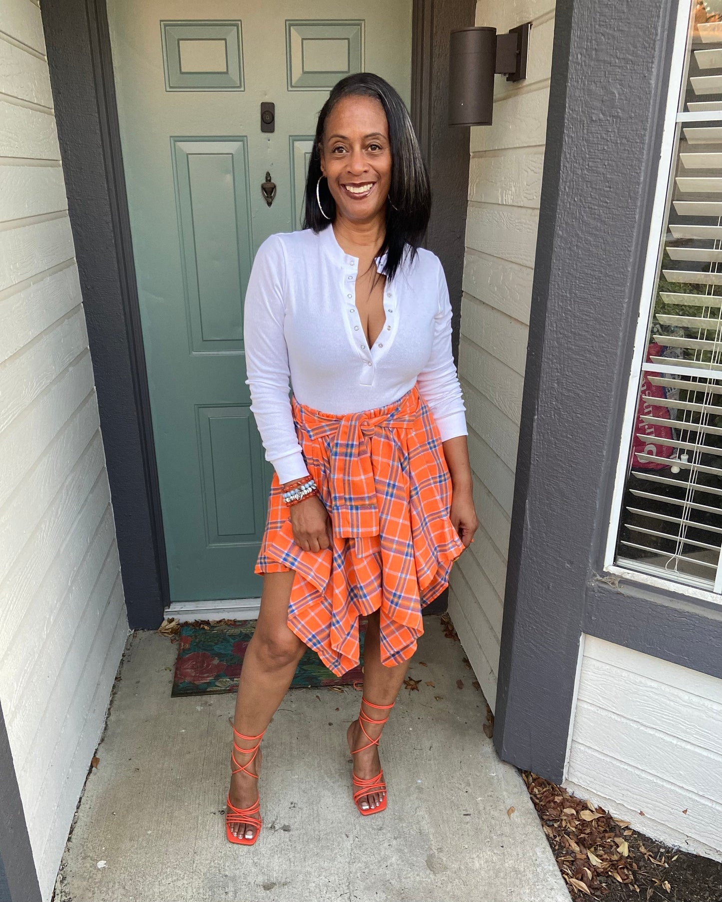 Faux sleeved plaid mini skirt